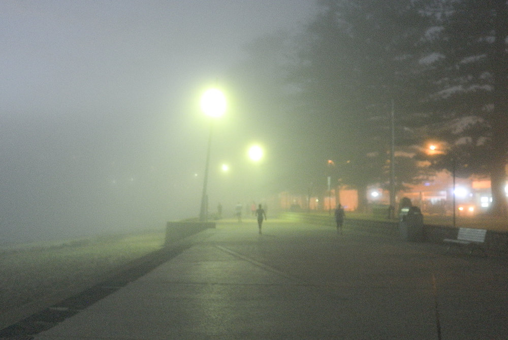 Foggy morning, Terrigal Esplanade: No direct golden light in this one but a bank of sea fog caused by a temperature inversion rolled in and the sunrise was filtered by it to give this unusual scene